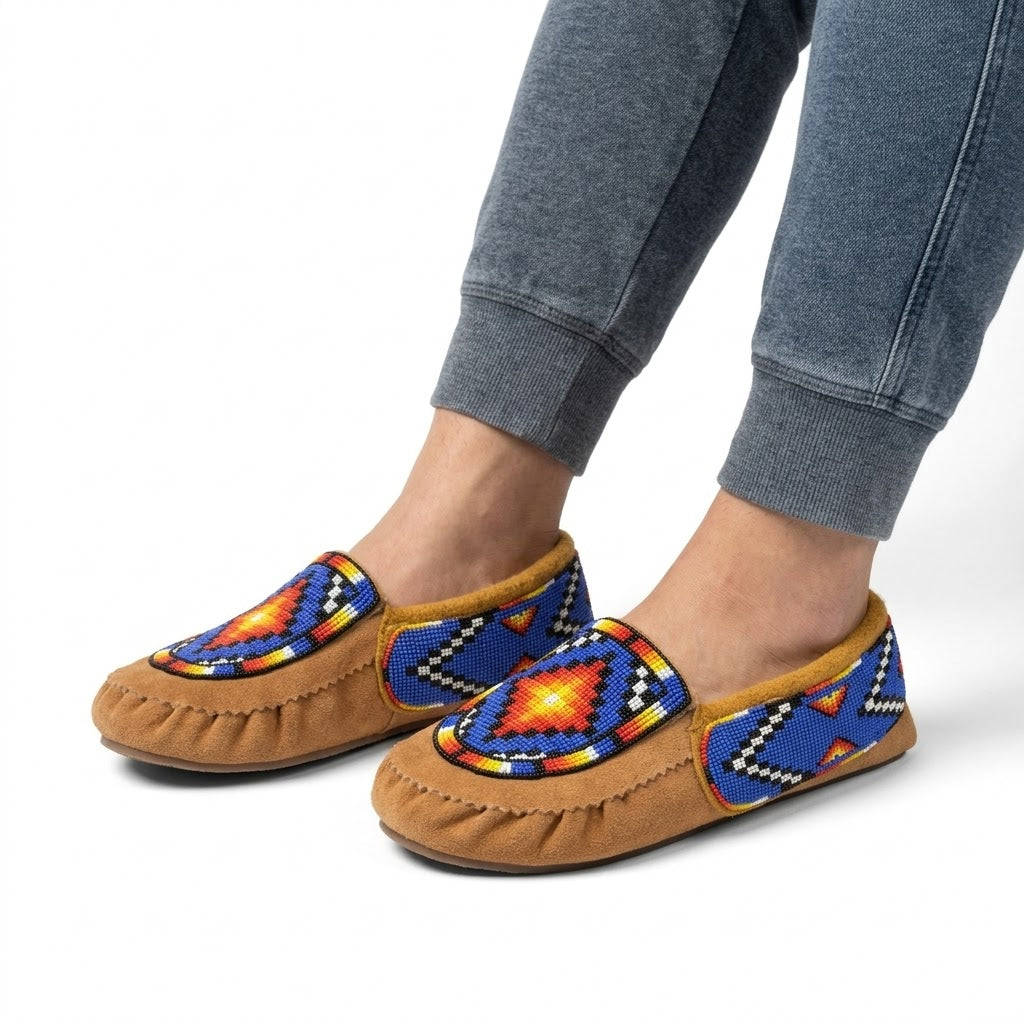 Morning Star moccasin showing the thick cream fleece lining and mustard-gold suede collar.